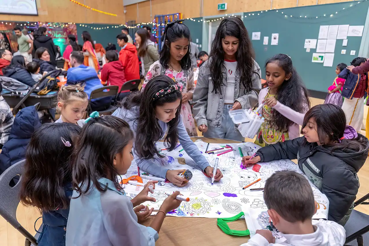 Children taking part in a colouring activity