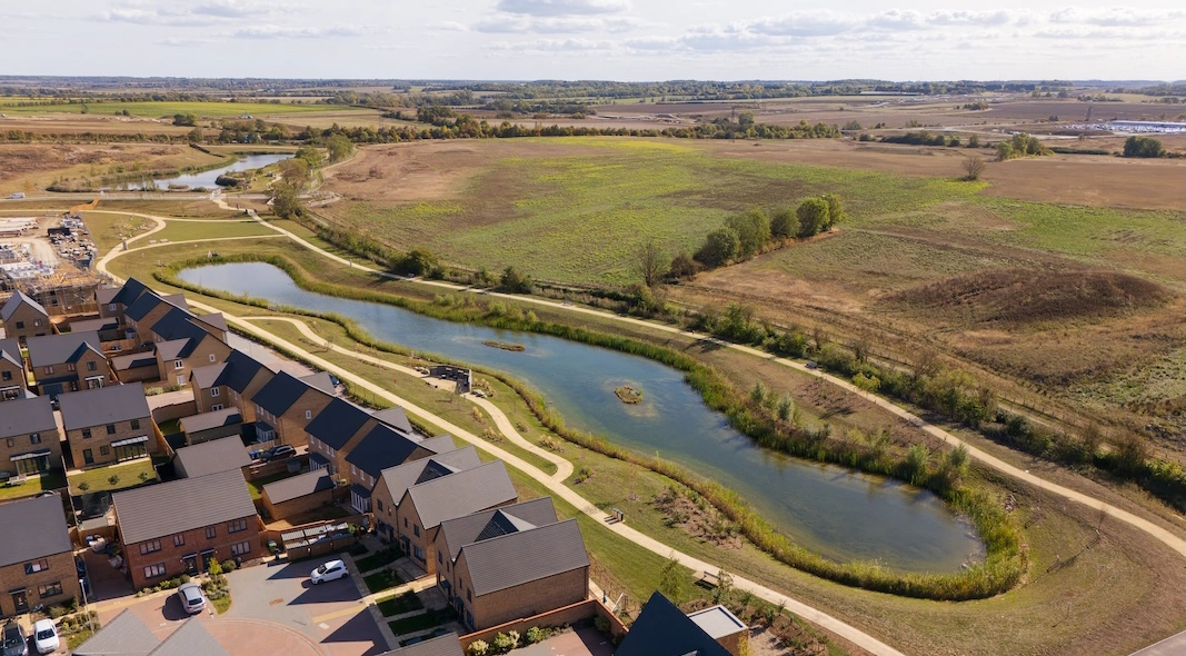 Aerial view of Wintringham Lakes with houses
