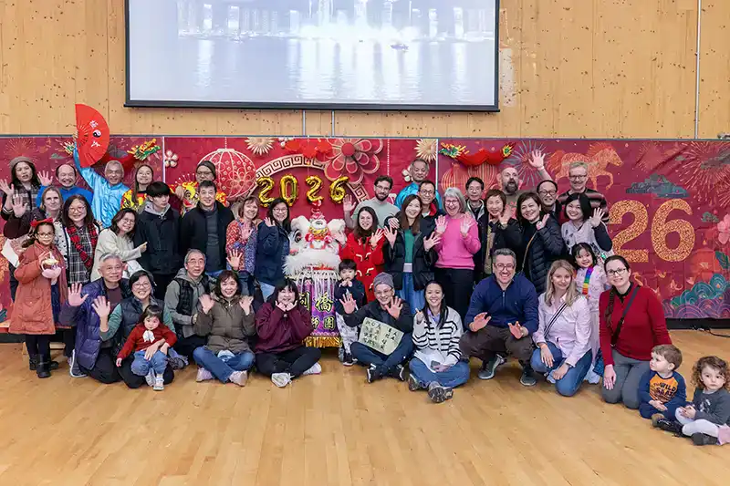 Group of people celebrating and waving